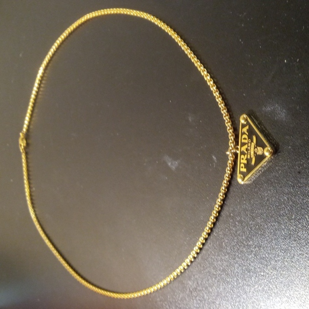 WOMEN'S GOLD AND BLACK PRADA PENDANT NECKLACE